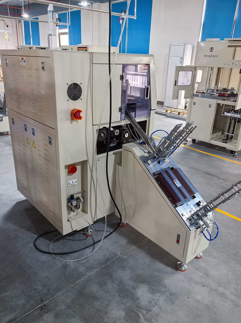 Package Trim and Form Machine